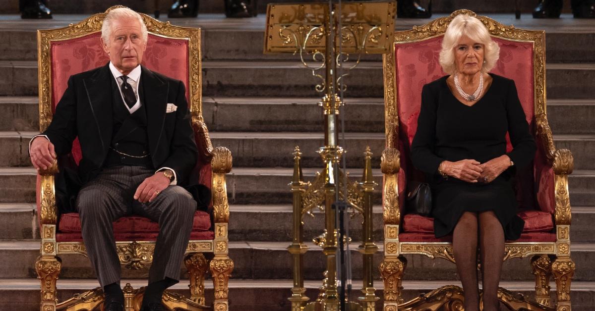 King Charles III and Camilla, Queen Consort (in black) take part in an address in Westminster Hall.