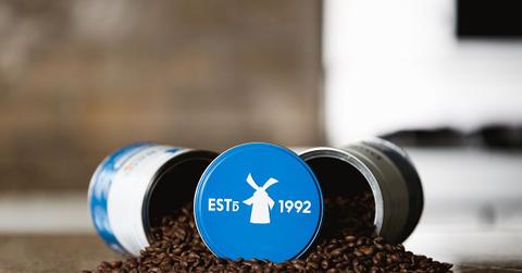 Dutch Bros coffee tins and beans