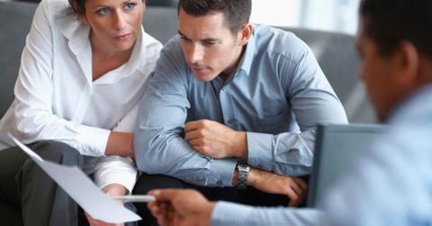 Couple looking at document