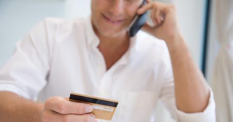 A person using a credit card