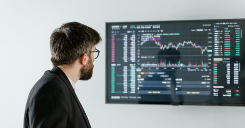 A man looking a crypto data