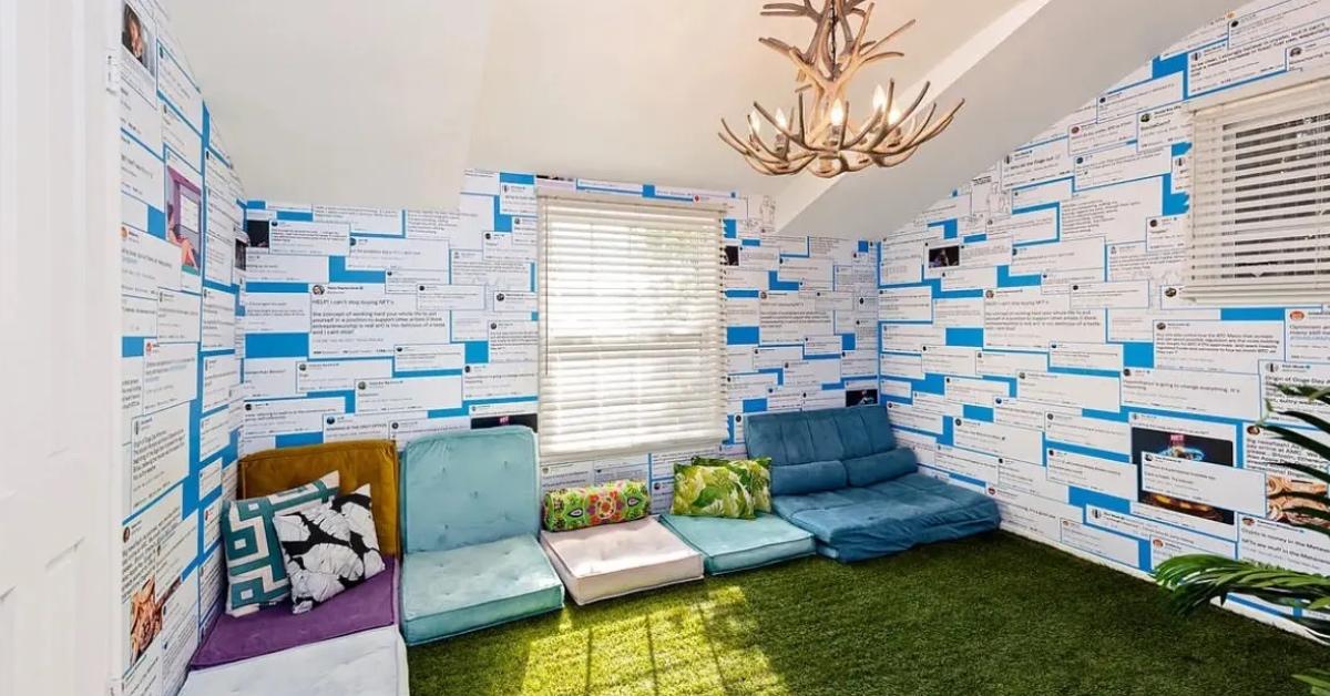 A room in the ugly crypto house with walls patterned with tweets and grass turf flooring.