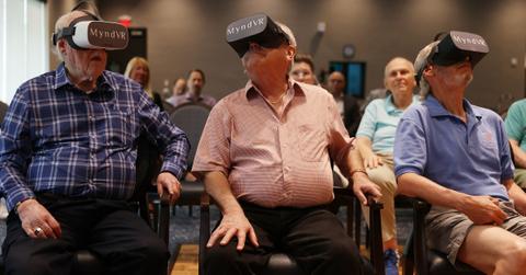 People using virtual reality headsets