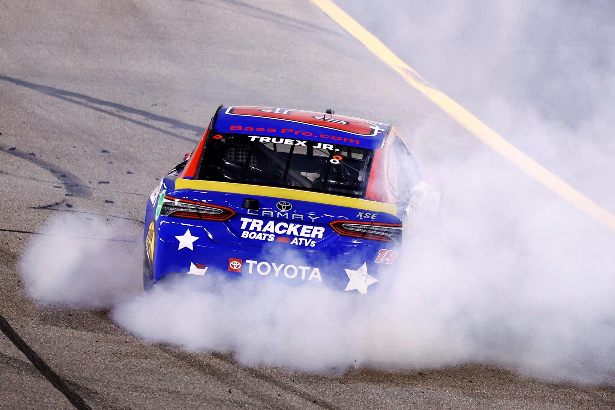 Nascar stock car with smoke