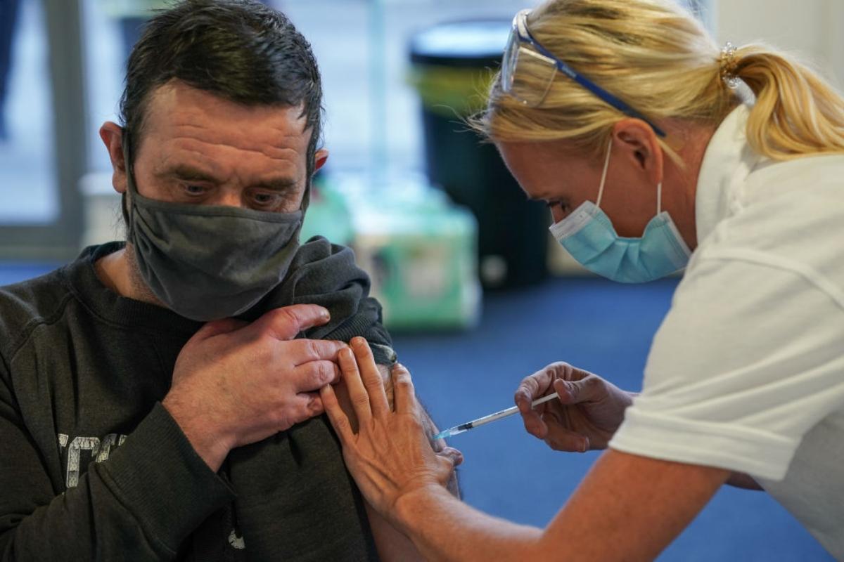 A man getting a COVID-19 vaccination