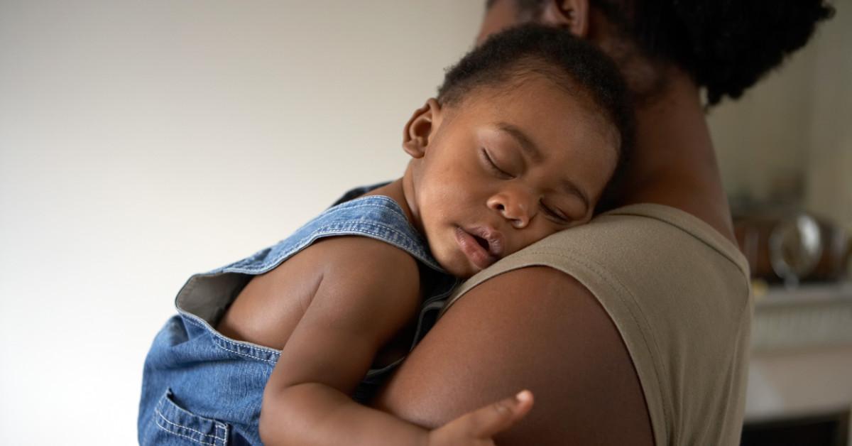 Mother and sleeping baby