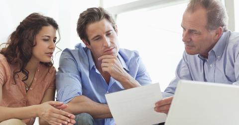 People reviewing a document