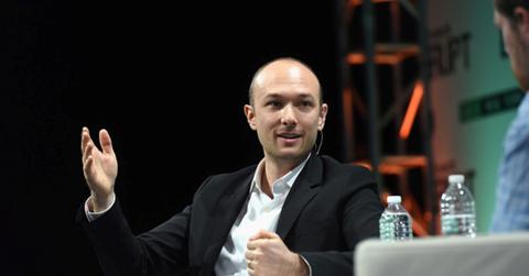 Lyft cofounder Logan Green speaking at a conference.