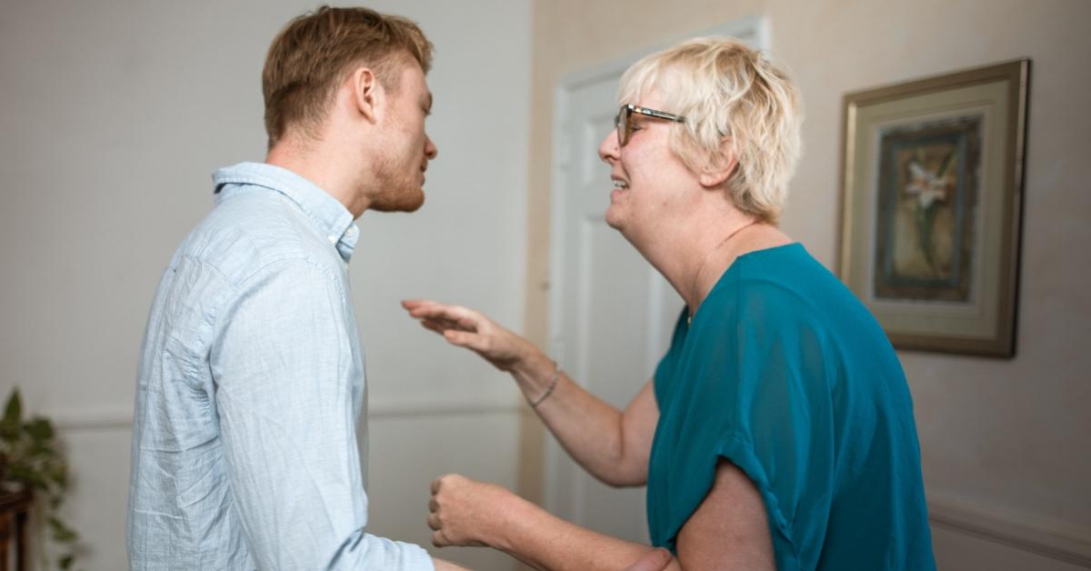 An elderly woman being financially abused