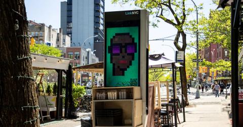 CryptoPunk NFT on sign outdoors