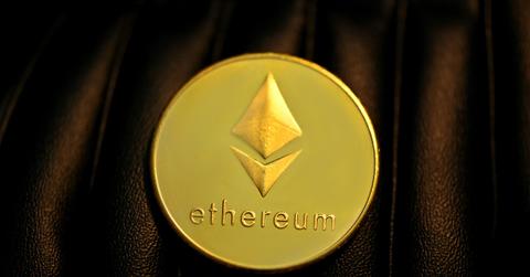 Ethereum coin on a dark leather surface