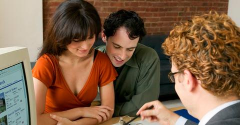 Couple with a real estate broker