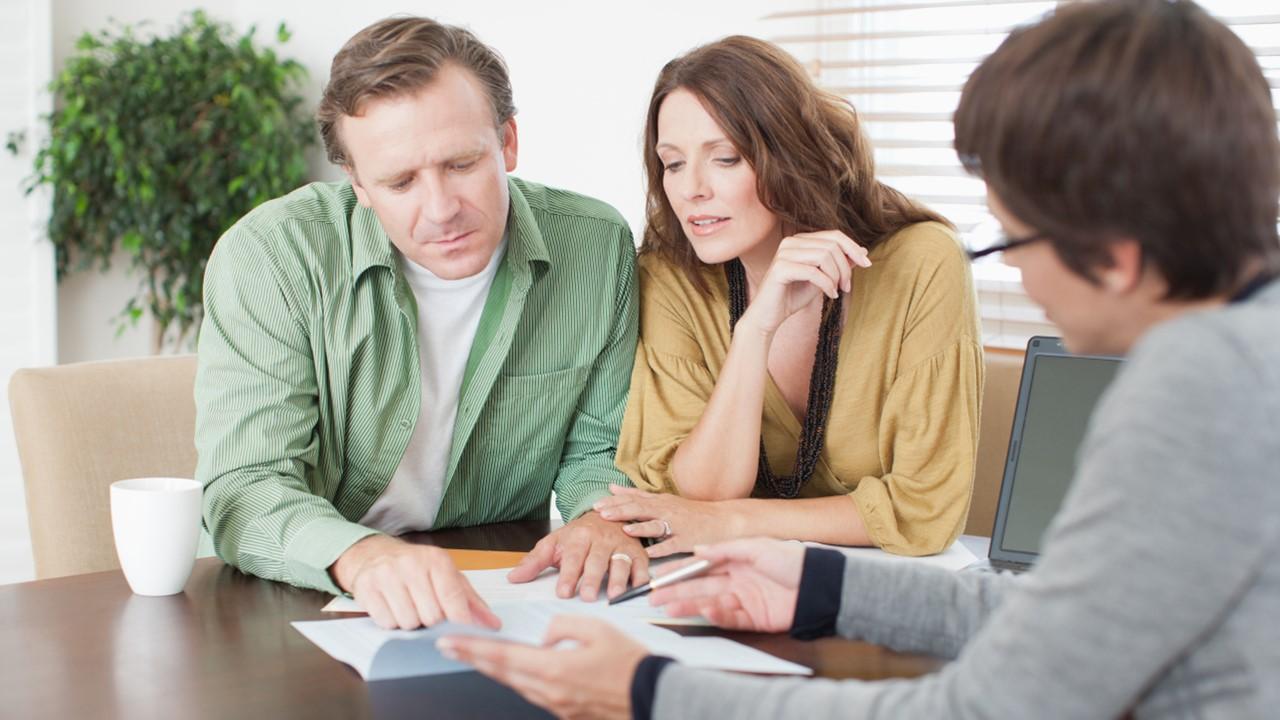 People discussing personal loan options