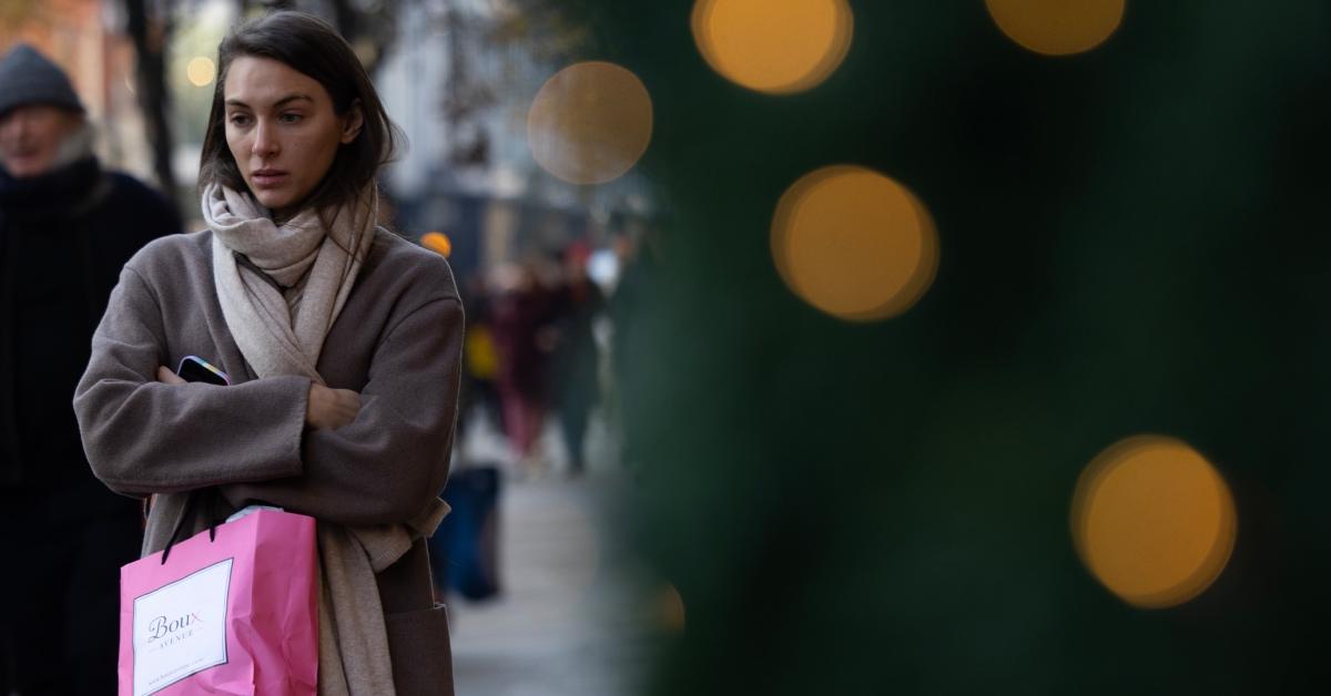 A concerned woman out shopping