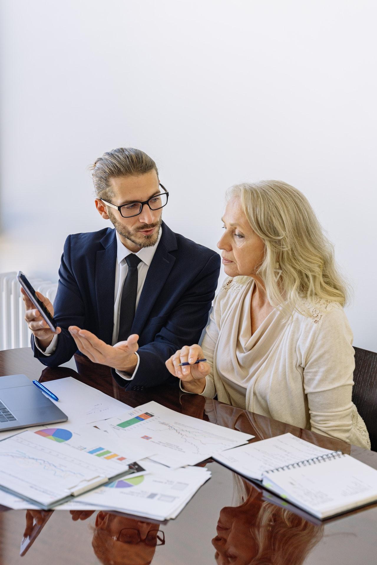 People reviewing payday loan data