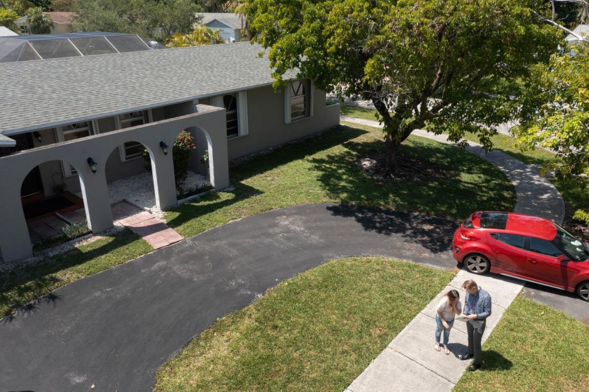 A realtor showing house to a buyer 