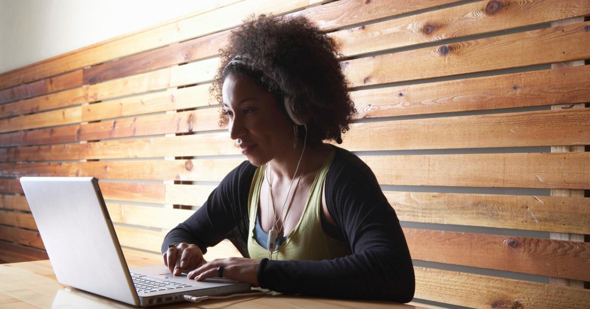 Woman listening to headphones