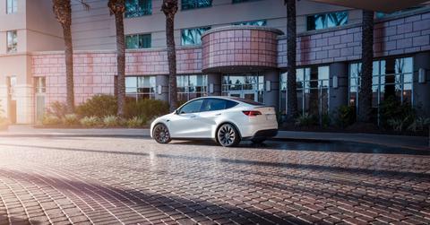 Tesla vehicle in front of building