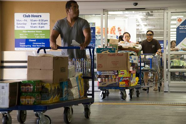 Shoppers leaving Sam's Club 