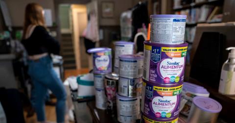 A stack of baby formula