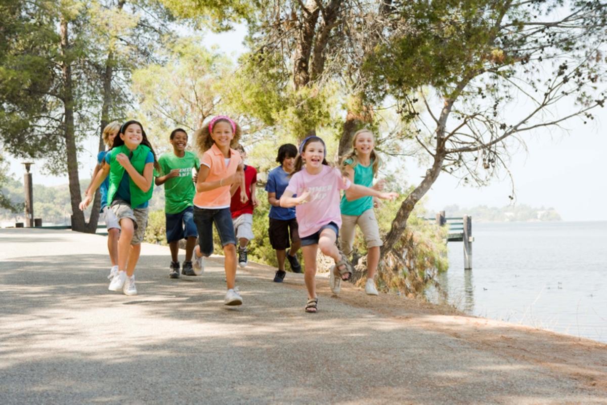 Kids running at summer camp