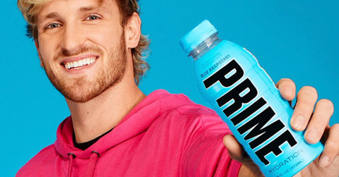 Logan Paul holding a Prime drink