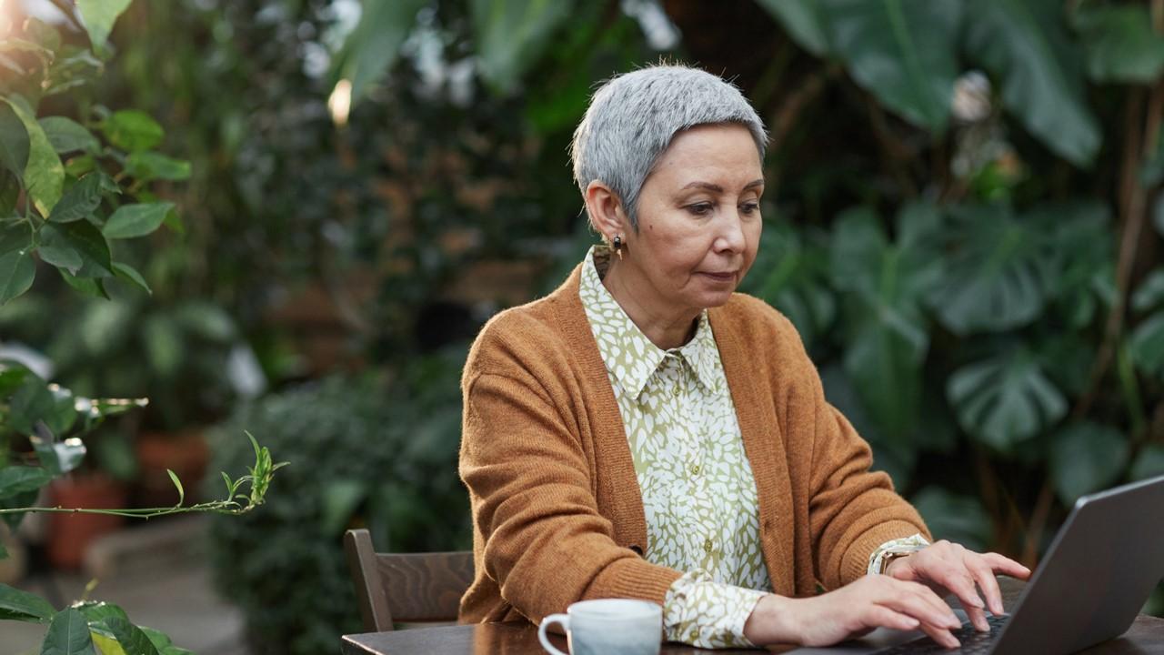 Senior citizen working on computer