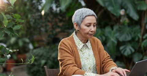 Senior citizen working on computer