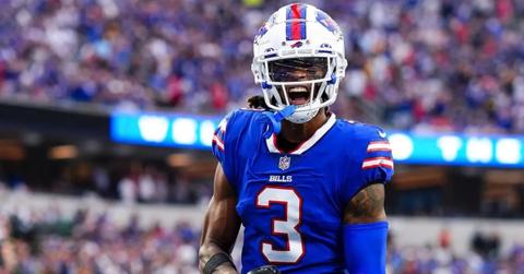 Damar Hamlin on his uniform on the football field.