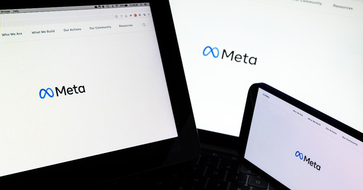 Meta logo on computer screens