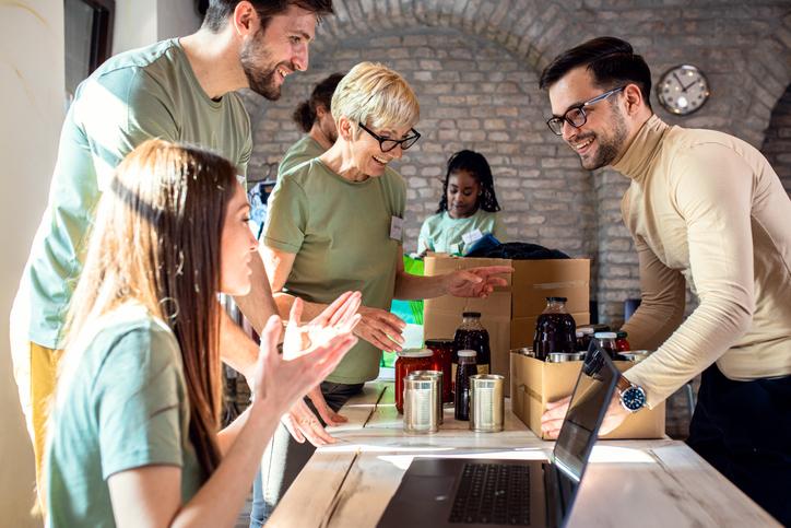 A group of people volunteering for a nonprofit. 