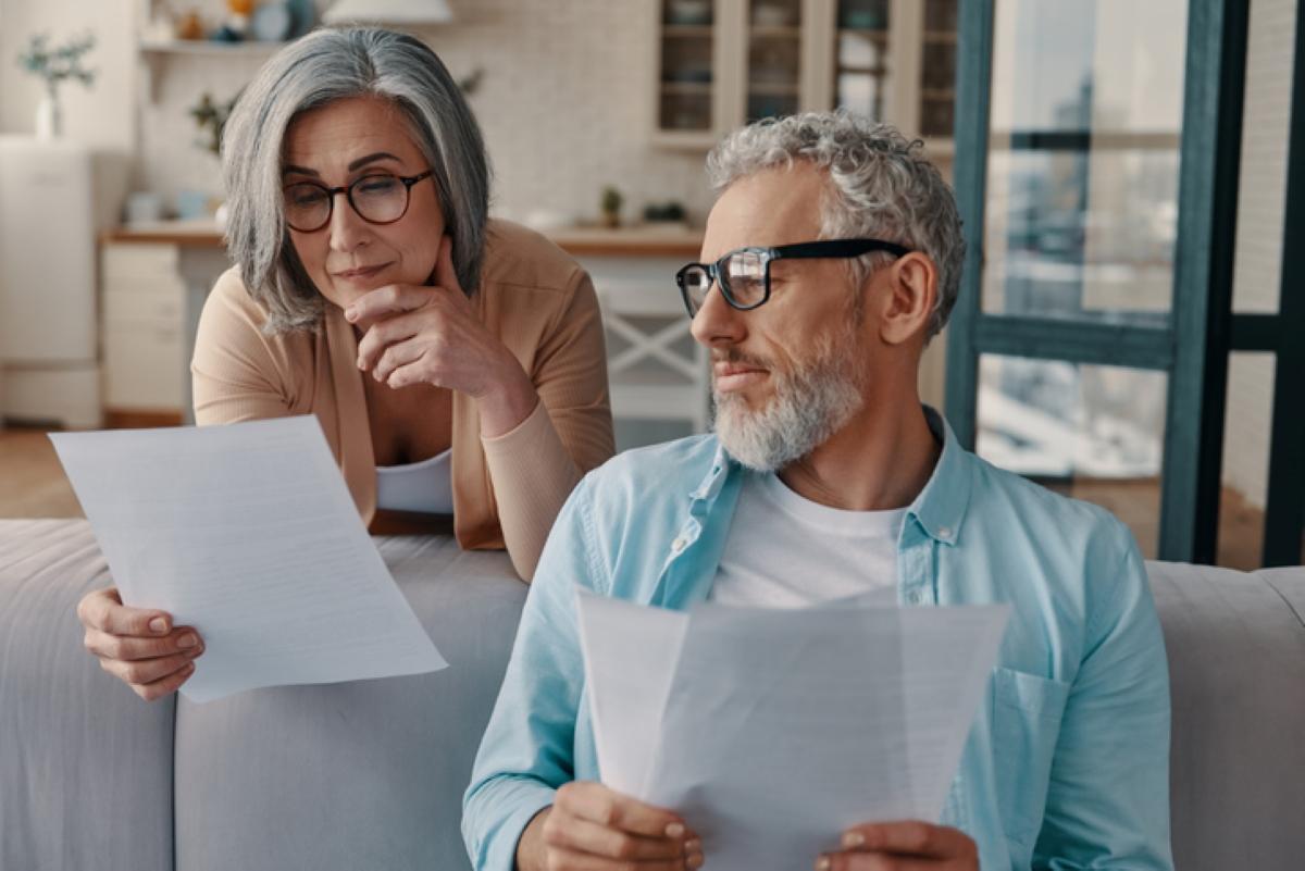 A couple reviewing financial documents